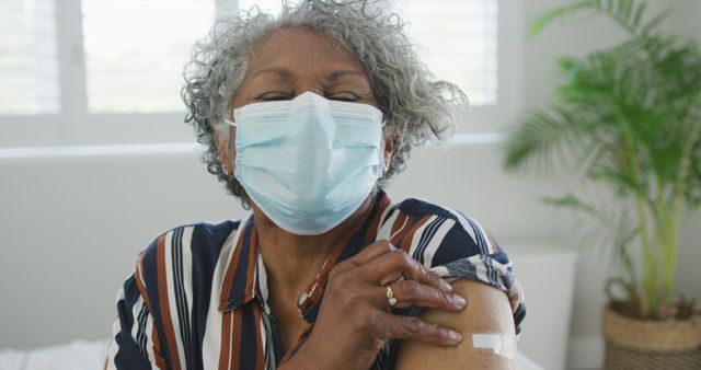 Elderly Woman Wearing Mask Receiving COVID-19 Vaccine - Download Free Stock Images Pikwizard.com