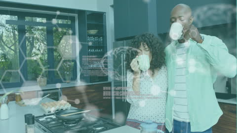 Modern Couple Enjoying Coffee While Immersed in Technology Overlay