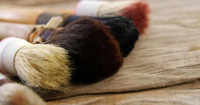 Close-Up of Artist Brushes on Wooden Table - Download Free Stock Images Pikwizard.com