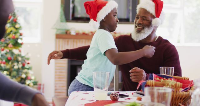 Grandfather and Grandson Celebrating Christmas at Home - Download Free Stock Images Pikwizard.com