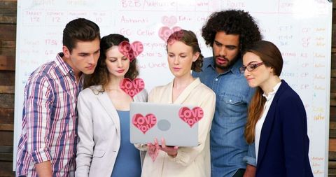 Business Team Collaborating with Romantic Icon Overlay