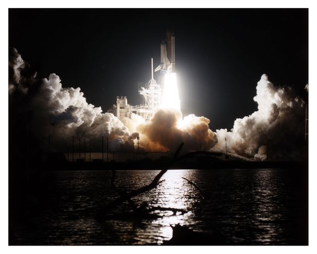The Space Shuttle Discovery cuts a bright swath through the early-morning darkness as it lifts off from Launch Pad 39A on a scheduled 10-day flight to service the Hubble Space Telescope (HST). Liftoff of Mission STS-82 occurred on-time at 3:55:17 a.m. EST, Feb. 11, 1997. Leading the veteran crew is Mission Commander Kenneth D. Bowersox. Scott J. "Doc" Horowitz is the pilot. Mark C. Lee is the payload commander. Rounding out the seven-member crew are Mission Specialists Steven L. Smith, Gregory J. Harbaugh, Joseph R. "Joe" Tanner and Steven A. Hawley. Four of the astronauts will be divided into two teams to perform the scheduled four back-to-back extravehicular activities (EVAs) or spacewalks. Lee and Smith will team up for EVAs 1 and 3 on flight days 4 and 6; Harbaugh and Tanner will perform EVAs 2 and 4 on flight days 5 and 7. Among the tasks will be to replace two outdated scientific instruments with two new instruments the Space Telescope Imaging Spectrograph (STIS) and the Near Infrared Camera and Multi-Object Spectrometer (NICMOS). This is the second servicing mission for HST, which was originally deployed in 1990 and designed to be serviced on-orbit about every three years. Hubble was first serviced in 1993. STS-82 is the second of eight planned flights in 1997. It is the 22nd flight of Discovery and the 82nd Shuttle mission