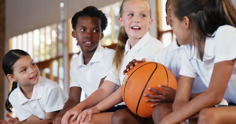 Kids Having Fun on Basketball Court at School Gym - Download Free Stock Images Pikwizard.com