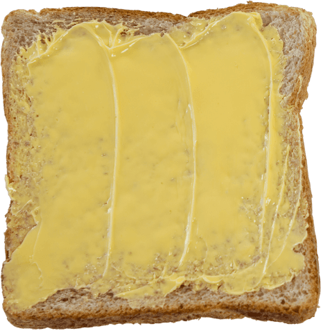 close-up of transparent spreadable butter on whole wheat bread slice - Download Free Stock Videos Pikwizard.com