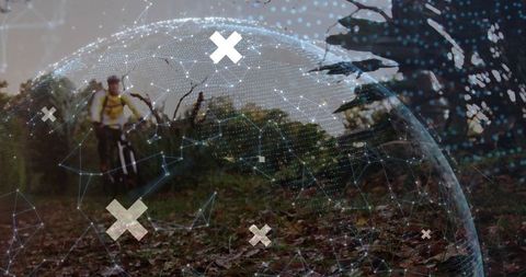 Cyclist surrounded by digital hologram on forest pathway