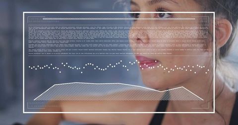 Focused Woman Athlete Monitoring Fitness Data on Augmented HUD While Training in Gym