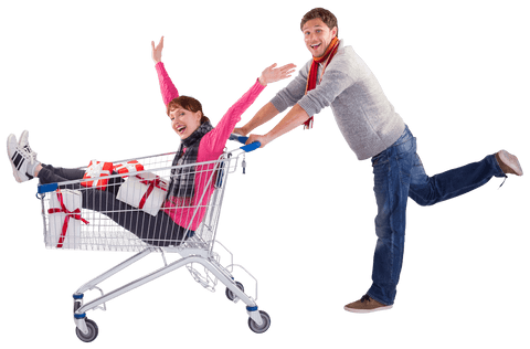 Excited couple with transparent trolley full of gifts