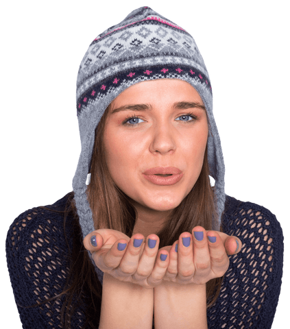 charming woman in knitted winter hat blowing transparent kiss - Download Free Stock Videos Pikwizard.com