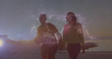 Couple Walking by Beach at Sunset with Cosmic Overlay