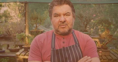 Confident Gardener Standing Proud Among Plants