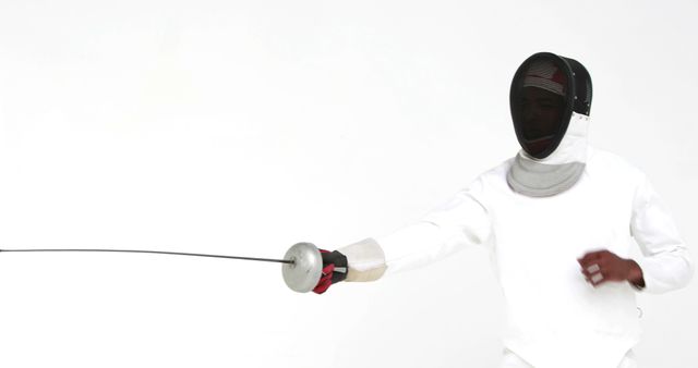 Fencer in Action Wearing Protective Gear and Mask - Download Free Stock Images Pikwizard.com