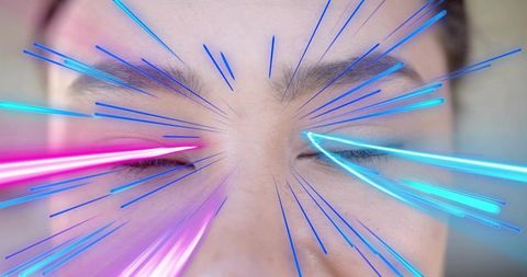 Close-up woman closing eyes with neon cyan and magenta rays, futuristic chromatic portrait