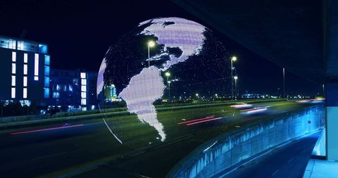 Holographic Globe Hovering Above Urban Highway Nightscape with Futuristic Neon Light Trails