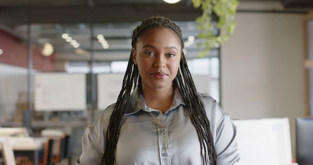 Confident African American Woman In Modern Office Workspace - Download Free Stock Images Pikwizard.com