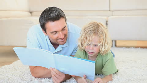 Father and Son Bonding Through Reading at Home