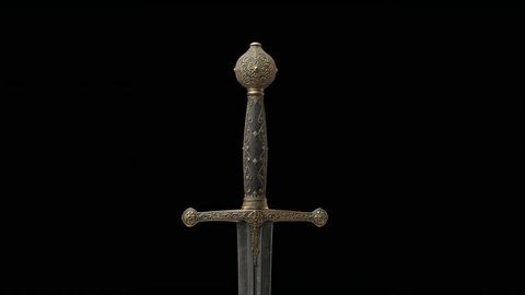 Ornate medieval sword hilt with intricate decorative details