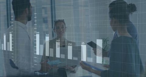 Financial data overlay with professionals collaborating in office