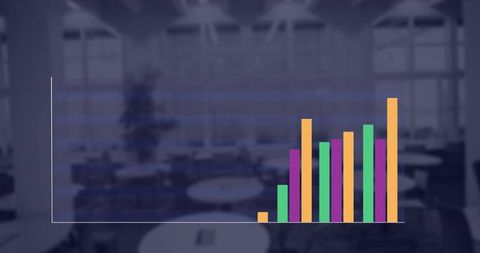 Overlay bar chart displaying colorful data visualization on blurred office workspace