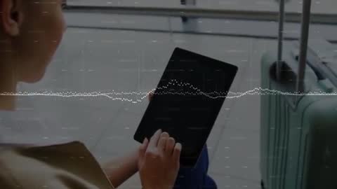 Traveler E-tapping Tablet with Audio Waveform Overlay Near Suitcase