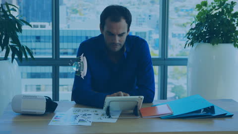 Businessman Using Tablet in Modern Office for Earth Day