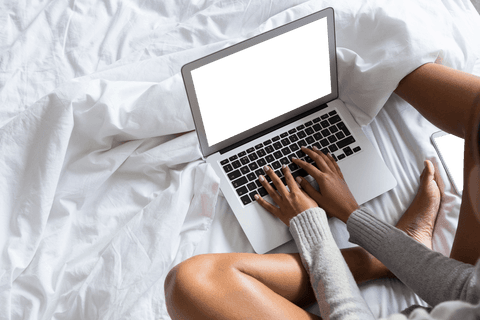 transparent scene of woman working on laptop in bed - Download Free Stock Videos Pikwizard.com