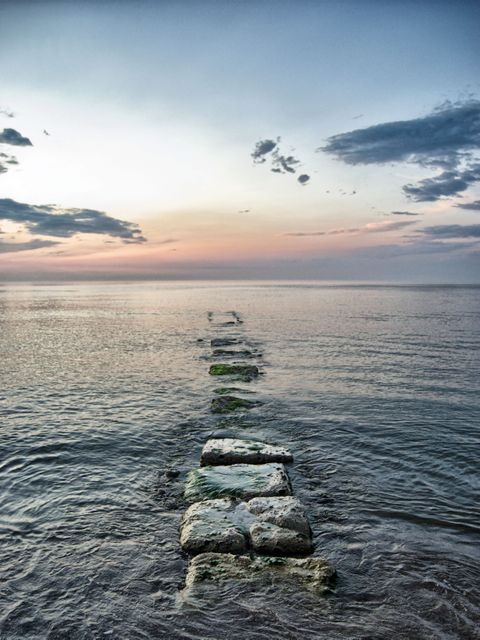 Rock Path Leading into Tranquil Sunset Seascape - Download Free Stock Photos Pikwizard.com