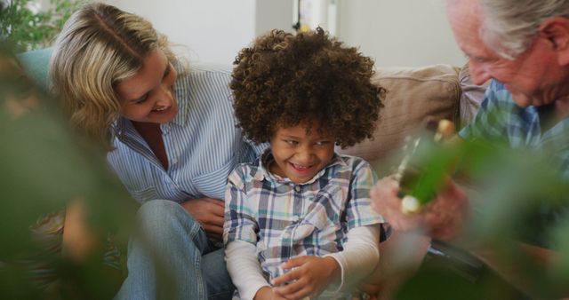 Grandparent Entertaining Grandchild with Joyful Family Connection - Download Free Stock Images Pikwizard.com