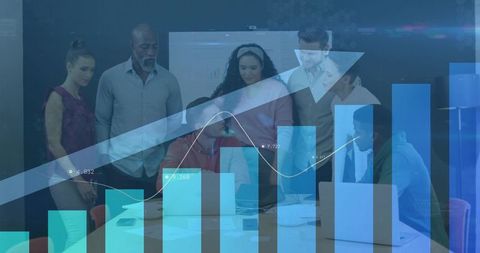 Diverse business team analyzing growth charts and metrics during collaborative meeting