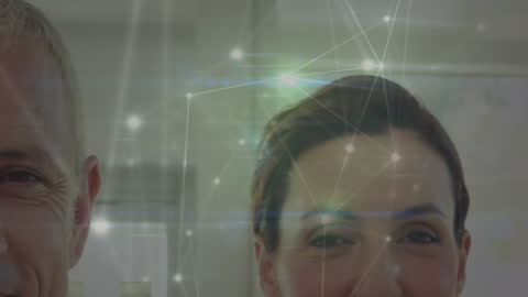 Caucasian Doctors Smiling with Digital Connectivity Overlay