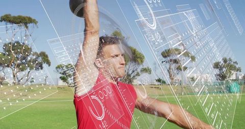 Male athlete performing overhead dumbbell press with futuristic hud fitness data overlay