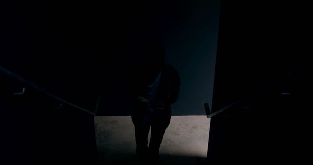 Dark Silhouette of Person Descending Stairs - Download Free Stock Images Pikwizard.com
