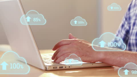 Cloud Computing Upload Percentages Over Businessman Using Laptop