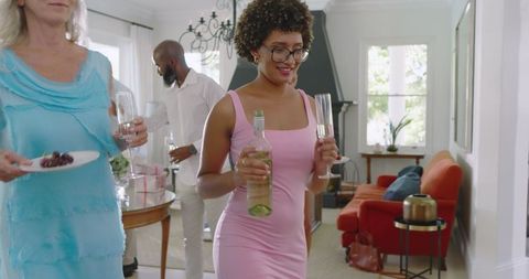 Guests socializing at elegant indoor wedding reception