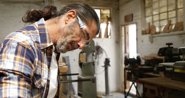 Skilled Craftsman Working on Wood Project in Workshop - Download Free Stock Images Pikwizard.com