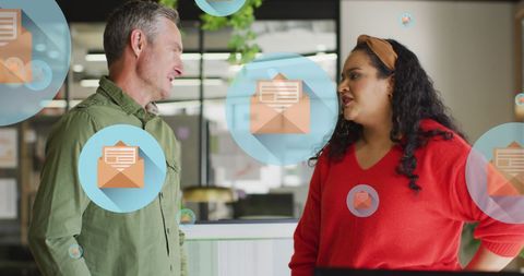 Diverse Team Collaborating with Digital Messages in Modern Office