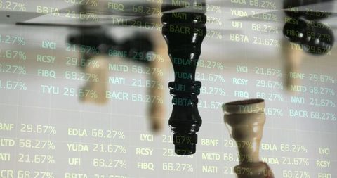 Chess pieces reflecting strategy with stock ticker overlay