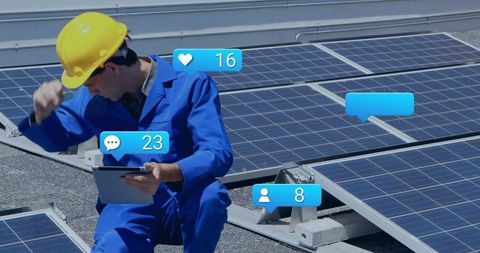 Solar technician inspecting rooftop panels using tablet in hardhat with digital icons