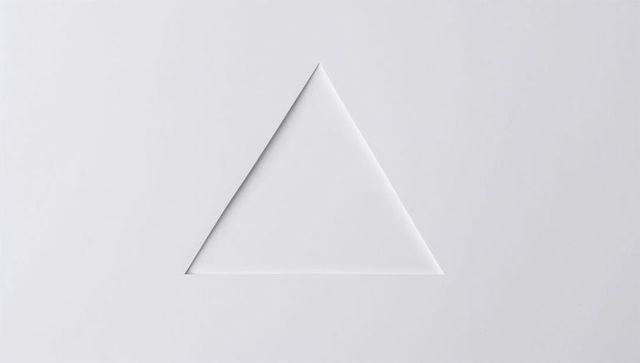 Minimal monochrome triangle cutout panel with soft bevel shadows and subtle tactile depth