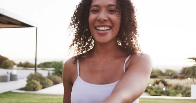 Smiling Young Woman Outdoors Reaching Towards Camera - Download Free Stock Images Pikwizard.com