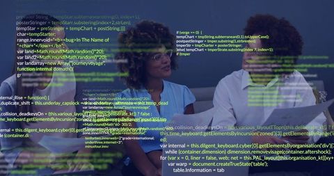 Discussing code and analytics, woman in blue blouse and man reviewing laptop for teamwork