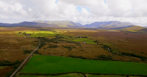 transparent green fields and mountains under blue sky - Download Free Stock Videos Pikwizard.com