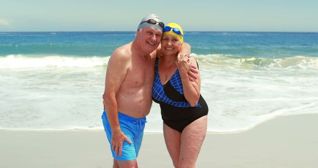 Senior Couple Smiling at Beach in Swimsuits - Download Free Stock Images Pikwizard.com