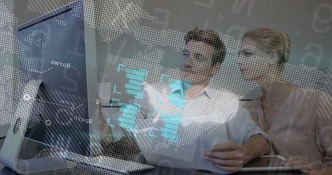 Business analysts collaborating on interactive data visualization with digital overlay