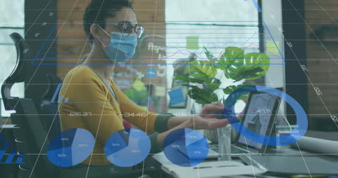 African American Woman Analyzing Data in Digital Office