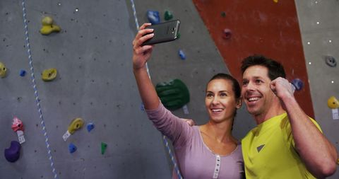 Couple Taking Selfie in Indoor Climbing Gym Setting