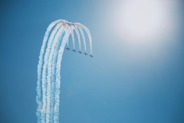 Military Jets Performing Aerobatic Maneuver in Clear Sky - Download Free Stock Photos Pikwizard.com