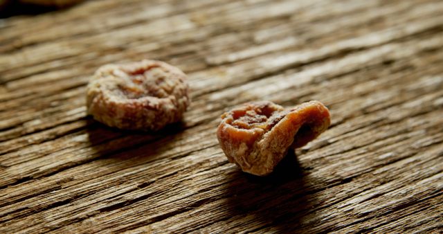Close-up of Dried Fruit Pieces on Wooden Surface - Download Free Stock Images Pikwizard.com