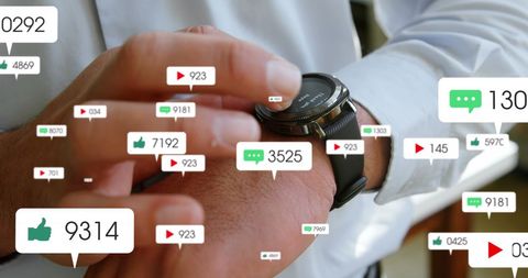 Businessman Engaging with Social Media on Smartwatch - Download Free Stock Images Pikwizard.com