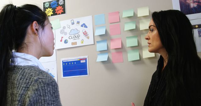 Businesswomen Brainstorming with Colorful Sticky Notes - Download Free Stock Images Pikwizard.com