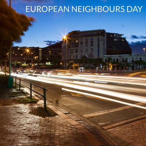 cityscape with blurred lights symbolizing community spirit at dusk - Download Free Stock Templates Pikwizard.com